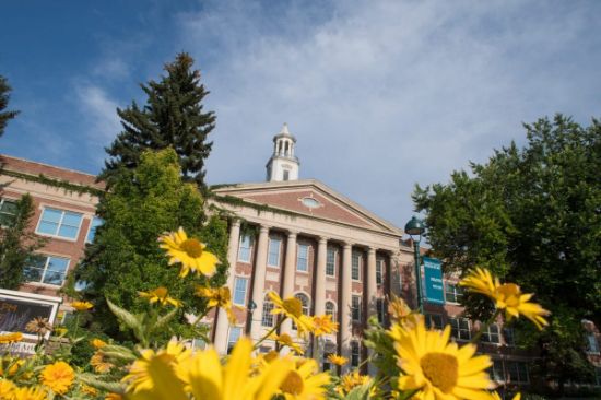 UCA with flowers in front of the building